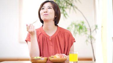 young woman enjoying breakfast