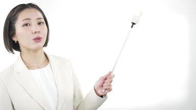 A woman explaining using a pointer (white background)