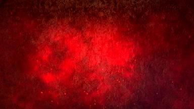 石壁の背景に赤い火花が漂う背景動画