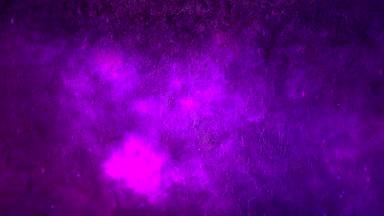 石壁の背景に紫の火花が漂う背景動画