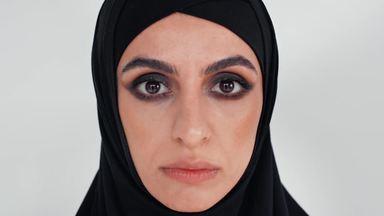 expressionless muslim woman
