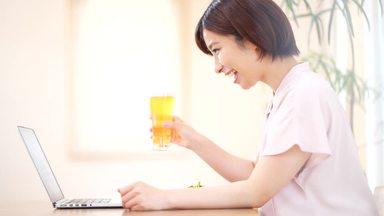 young woman having an online drinking party