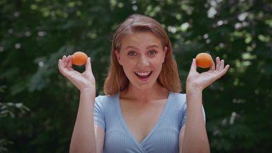 woman with apricot