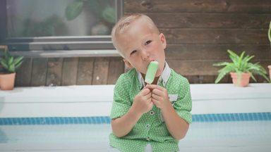 boy happily eating ice cream